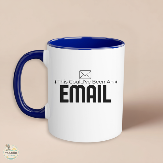 White mug with blue interior and handle, featuring text 'This Could've Been An EMAIL' on a beige background.