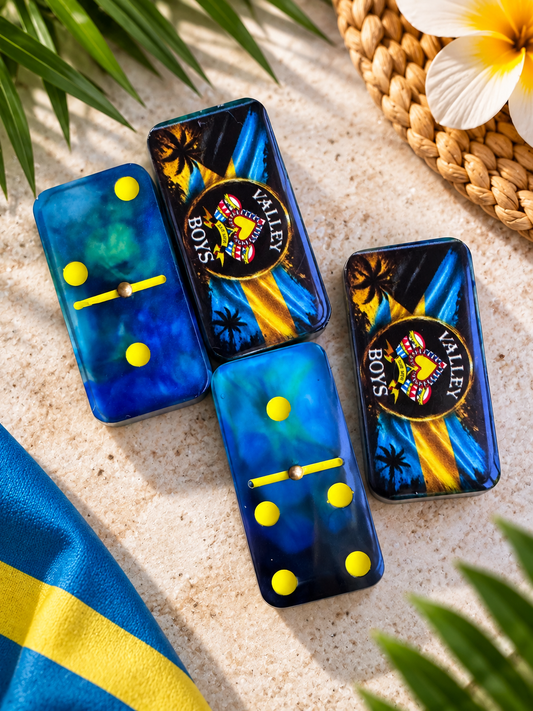 Custom resin dominoes featuring colorful Junkanoo-inspired designs