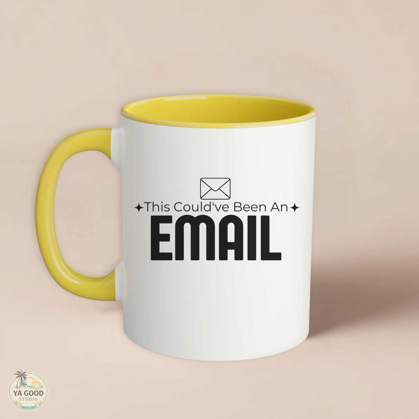 White mug with yellow interior and handle, featuring text 'This Could've Been An EMAIL' on a beige background.