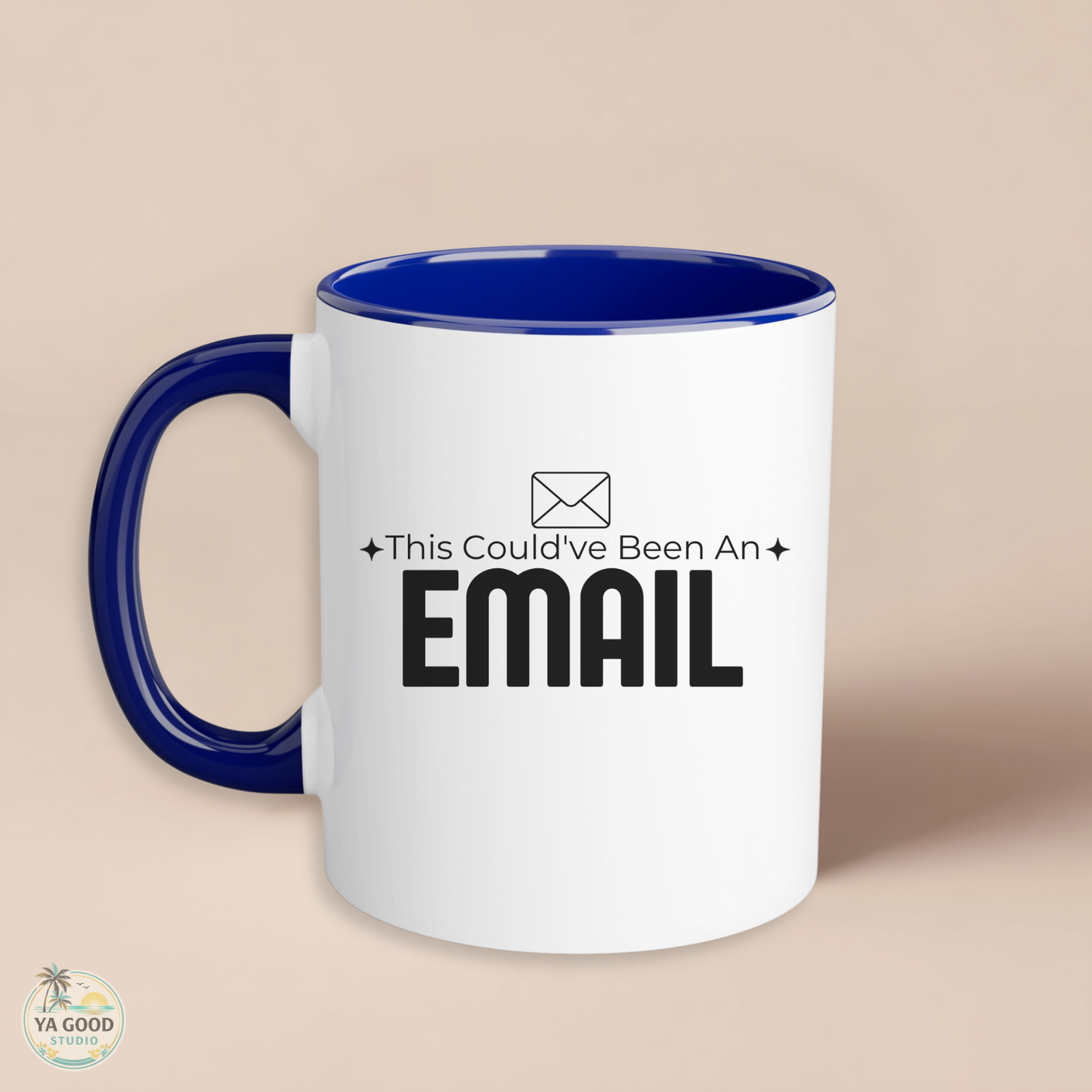 White mug with blue interior and handle, featuring text 'This Could've Been An EMAIL' on a beige background.