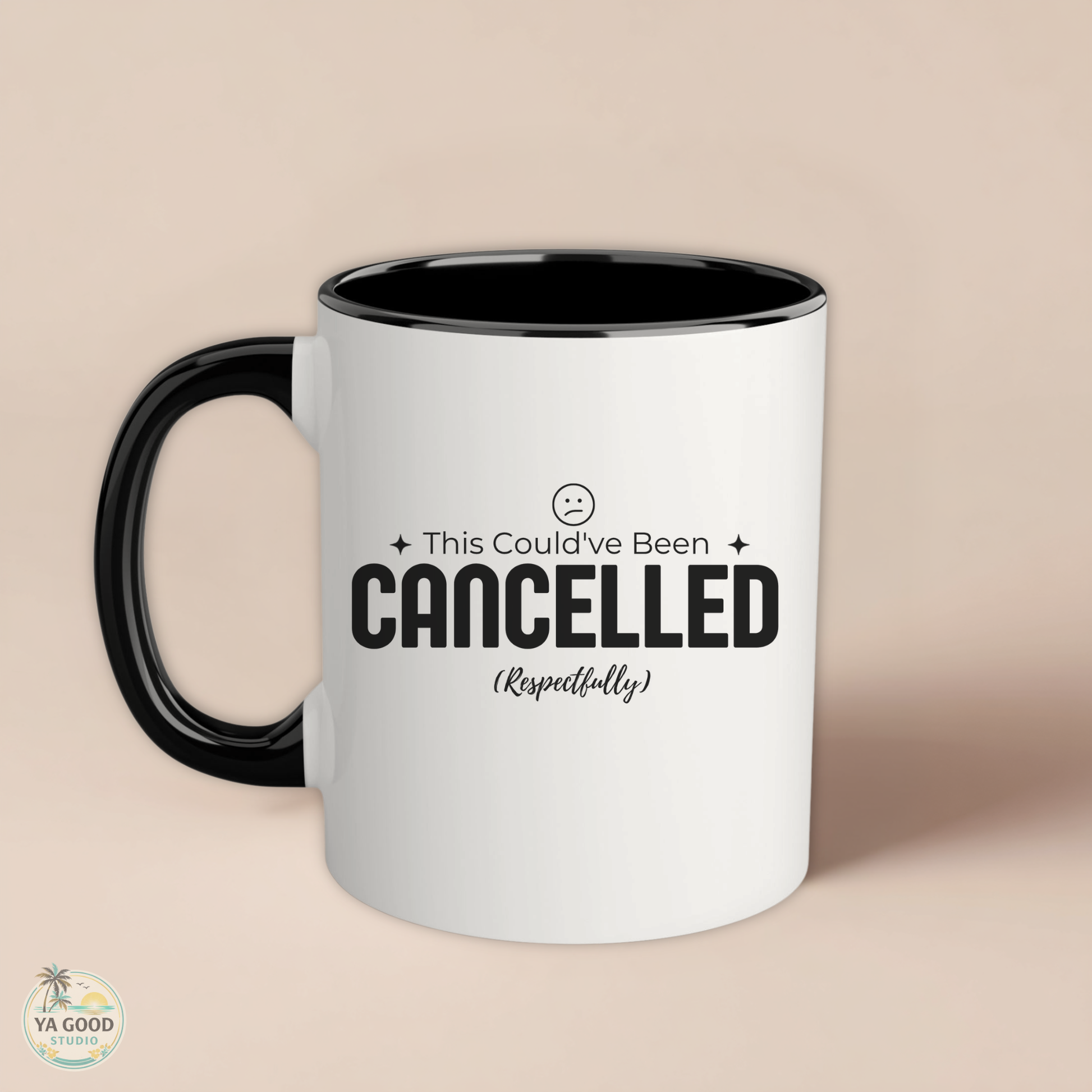 White mug with black interior and handle, featuring text 'This Could've Been Cancelled Respectfully' on a beige background.