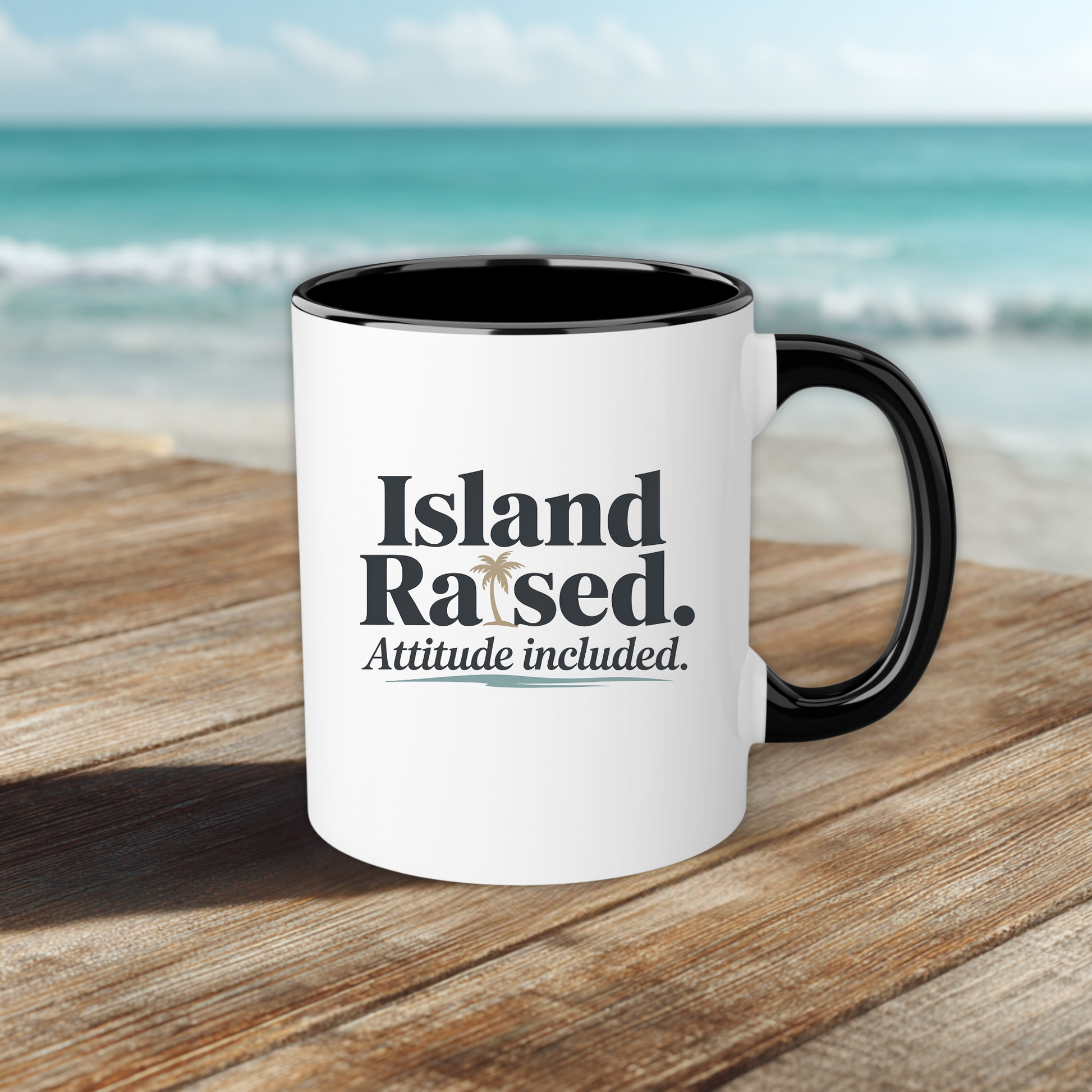 White mug with black interior and handle on a wooden surface with a beach background