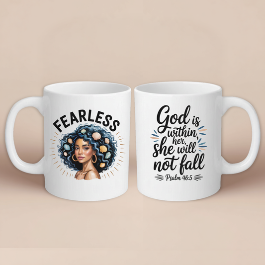 A white mug showing both sides. One side has the word fearless with a design and the other has a bible verse. The mugs are on a plain beige background.
