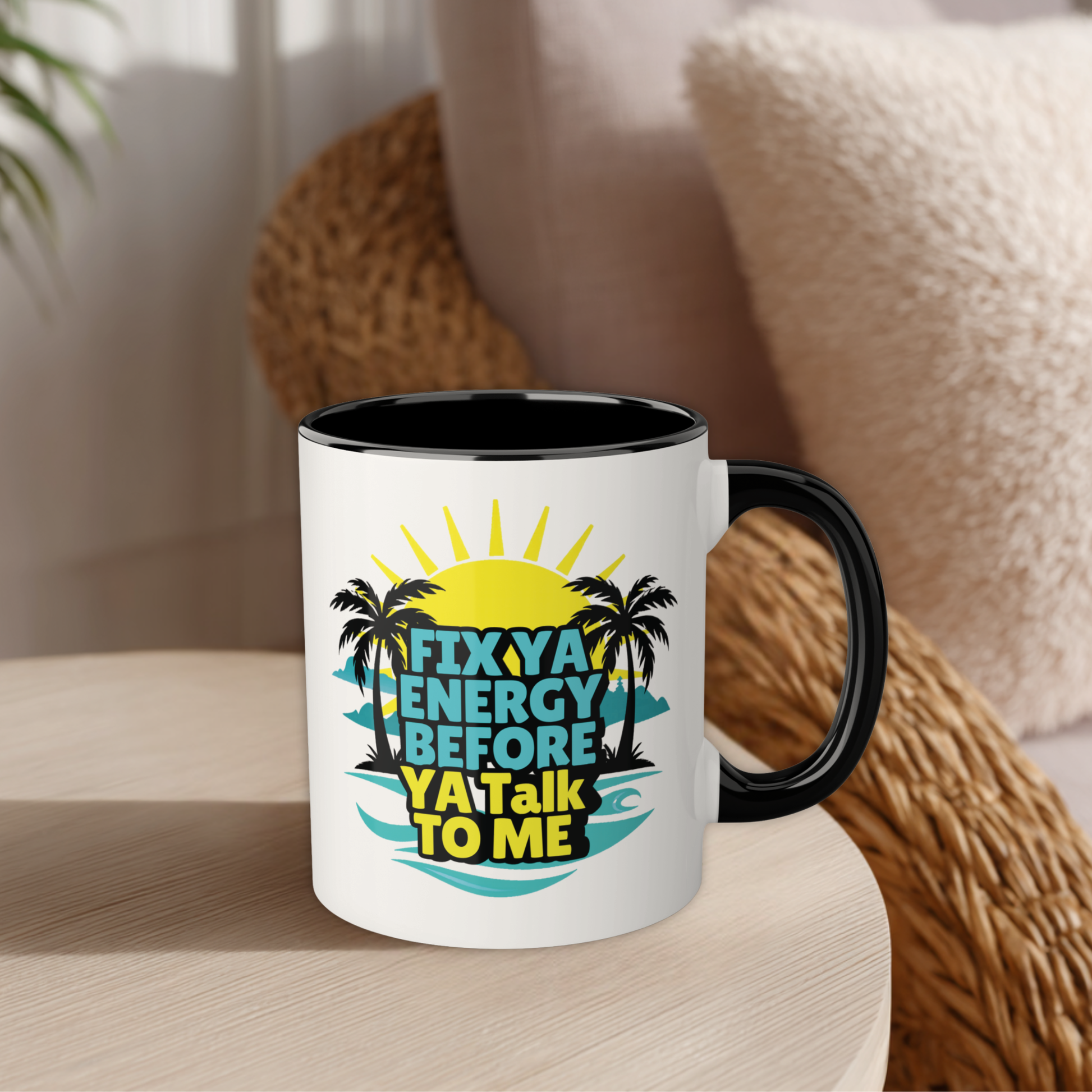 White mug with black handle featuring a tropical design and text on a wooden surface.