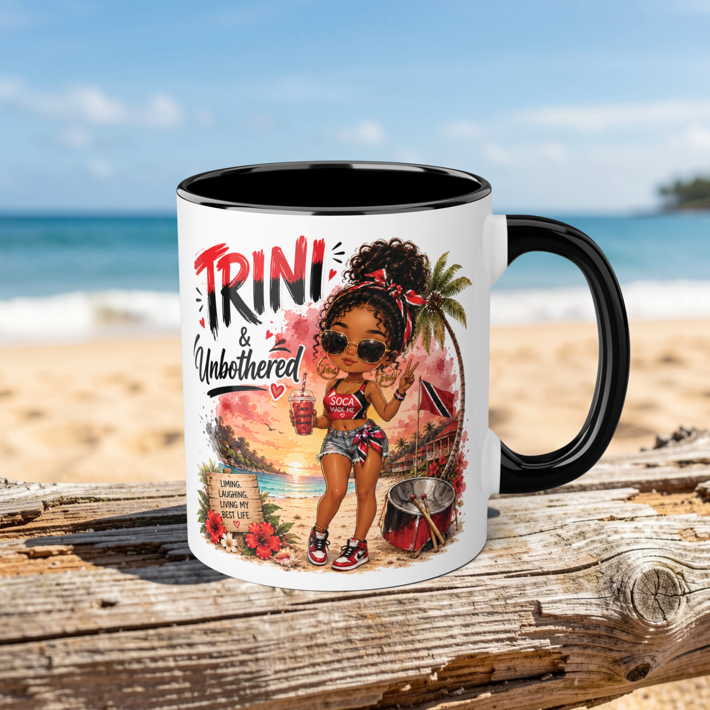 Mug with a design of a girl on a beach and 'TRINI & Unbothered' text, placed on a wooden surface with a beach background.