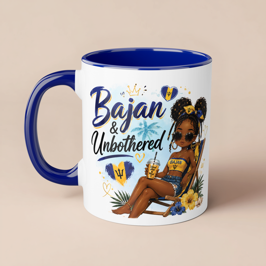 Mug with a design of a woman sitting by the beach, text 'Bajan & Unbothered', and the Barbadian flag.